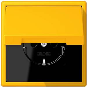 Фото Jung Le Corbusier LC1520KIKL4320W Розетка с крышкой и с заземляющим контактом (16 А, под рамку, шторки, скрытая установка, le jaune vif)