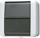 Jung WG800 807W Выключатель одноклавишный перекрестный (10 А, с возм. подсветки, в сборе, открытая установка, серый/черный)