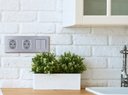 Legrand Inspiria 673732 розетка с заземлением и интегрированными защитными шторками для скрытого монтажа, цвет "Алюминий". Максимальный ток 16 А, напряжение ~250В, максимальная мощность 3680 Вт.